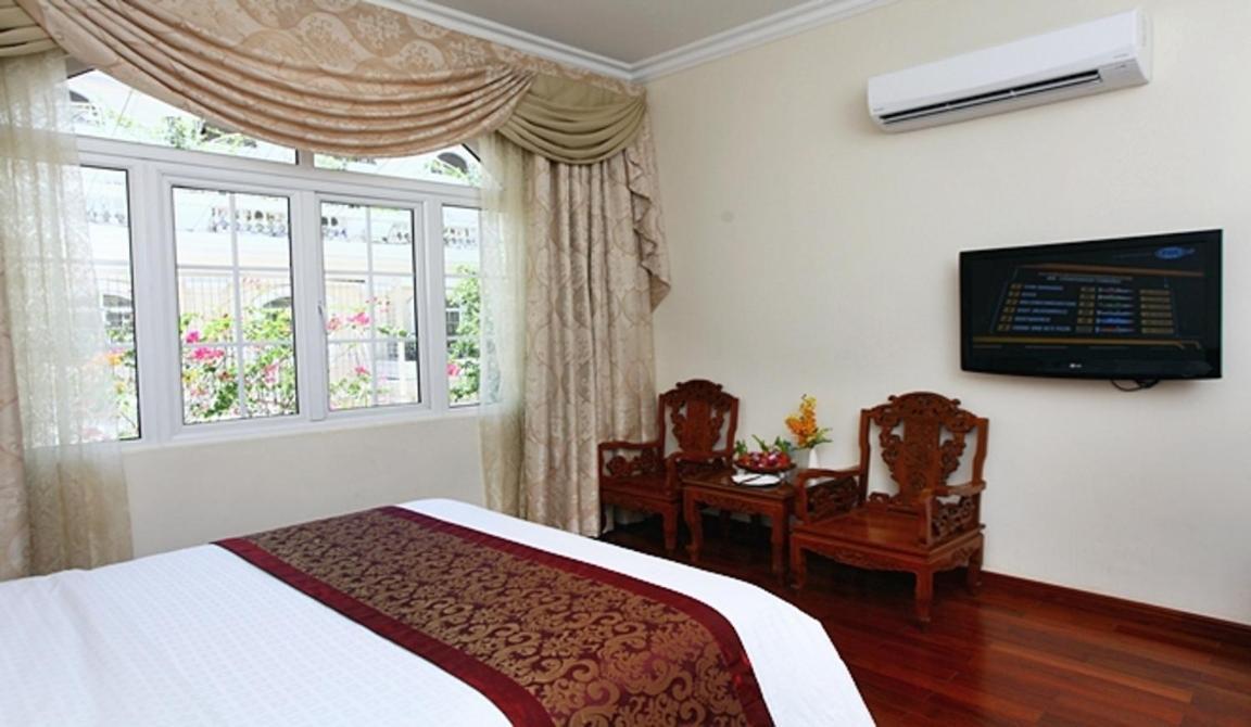Hotel Continental Saigon Cidade de Ho Chi Minh Quarto foto
