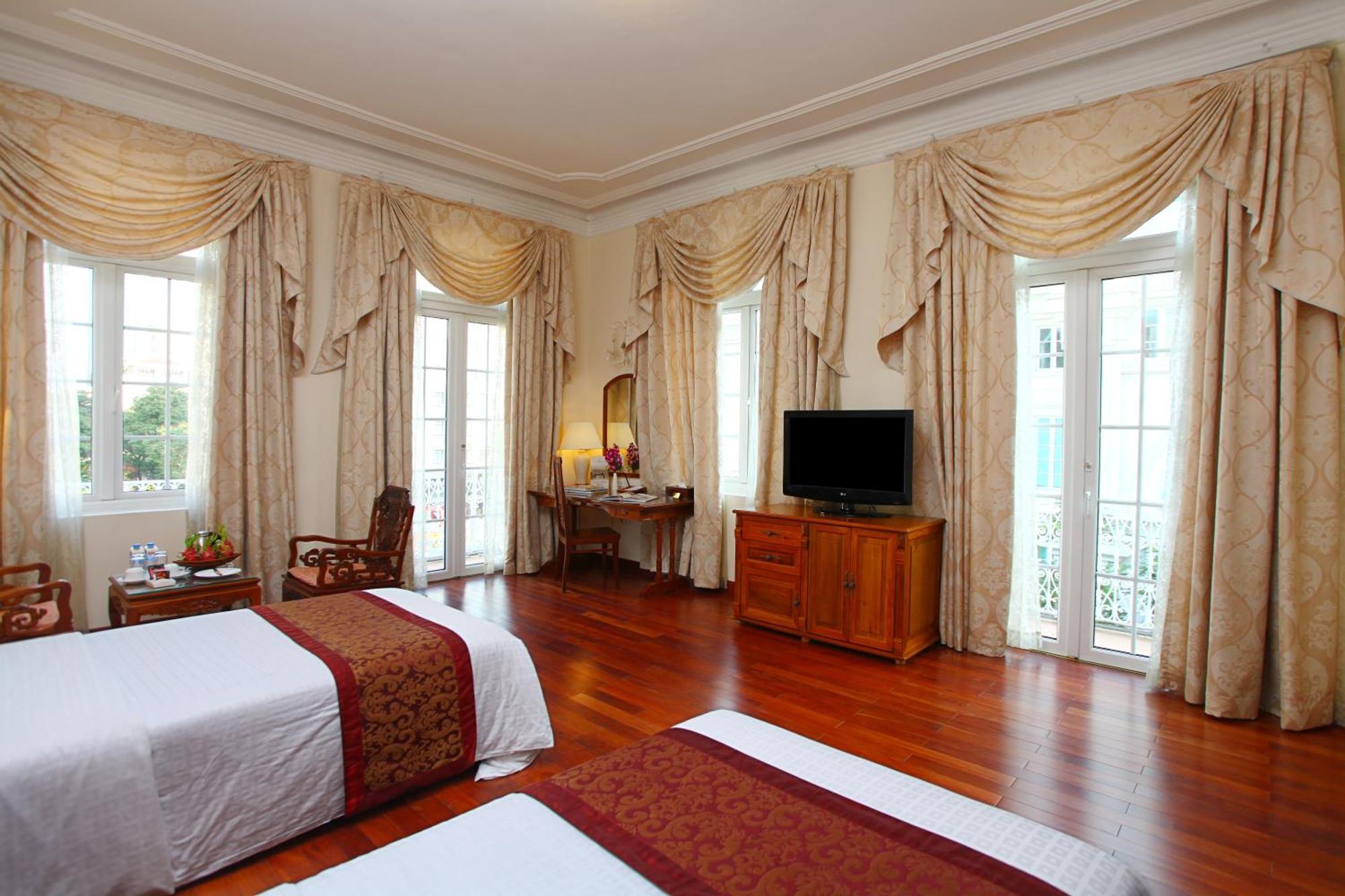 Hotel Continental Saigon Cidade de Ho Chi Minh Quarto foto